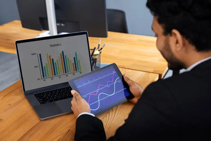 Cryptocurrency coins and charts representing Passive Income Crypto Strategy